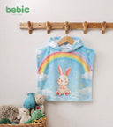 Bebic summer poncho made of lightweight fabric, featuring a casual design with vibrant colors and relaxed fit for warm weather.
