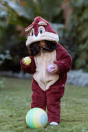Baby wearing a Bebic infant animal jumpsuit, cozy and cute clothing with animal print details for comfort and warmth.