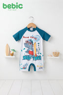 Bebic Surfing Dino Romper for babies featuring a playful dinosaur print and vibrant colors, made of soft, comfortable fabric.