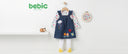 Bebic Garden Friends clothing featuring colorful, whimsical garden-themed designs on fabric.