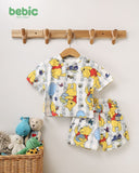 Bebic Winnie Honey Summer Set for children, colorful clothing with playful Winnie the Pooh design, suitable for warm weather.